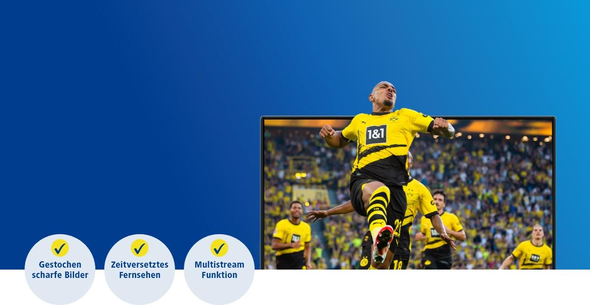 tv bildschirm mit herausspringendem bvb fussballer auf blaue