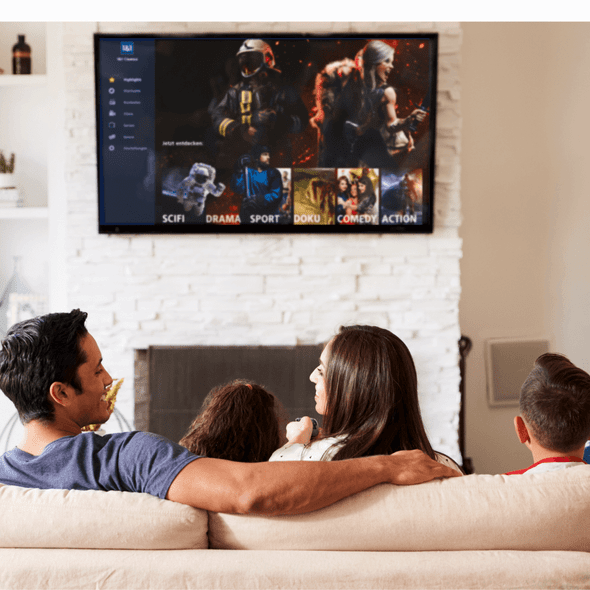 familie schaut eins und eins cinema auf tv